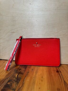 kate spade New York red wristlet with gold-tone zipper